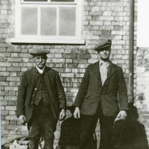 1935 French Hall Farm Mr Elsdon Reg Johnson cowmen. Reg later worked at Moulton Paddocks.