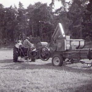 1953 Trinity Hall farm Bob Saltmarsh boy on tractor