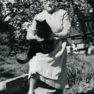 1960 Chippenham Rd Annie Clark in her garden postlady 1