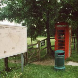 2007 June The Street footpath map litter bin phone box
